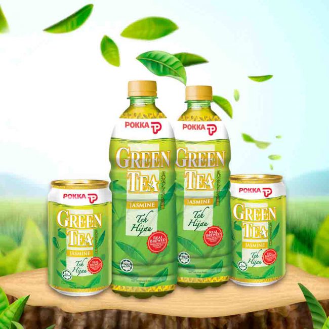 Range of POKKA Green Tea on top of tree with greenery background